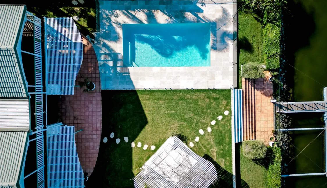 Drone shot of Aqua Living Pools Helensvale project - family pool design